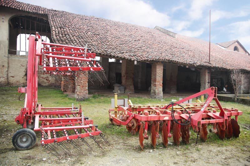 Red, Agricultural machinery, Machine, Rural area, Roof, Field, Village, Farm, Cottage, Tractor, 