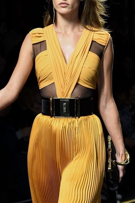 Yellow, Shoulder, Joint, Style, Fashion accessory, Fashion model, Waist, Fashion show, Fashion, Model, 