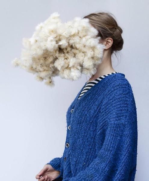 Ear, Blue, Hairstyle, Sleeve, Shoulder, Textile, Style, Electric blue, Earrings, Sweater, 