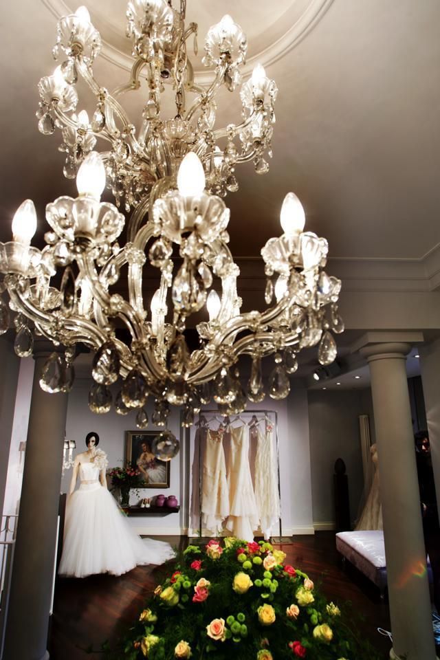 Petal, Dress, Bouquet, Interior design, Interior design, Light fixture, Flower Arranging, Gown, Floristry, Ceiling fixture, 