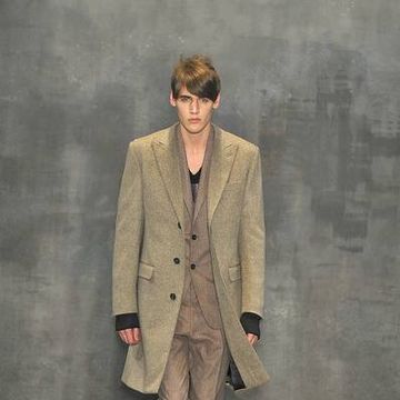 Clothing, Sleeve, Collar, Coat, Human body, Fashion show, Outerwear, Style, Formal wear, Suit, 