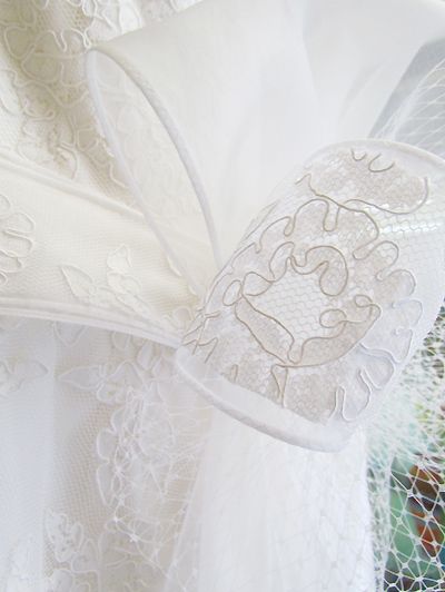 Lace, Embellishment, Wedding dress, Bridal accessory, Ivory, Angel, Bridal clothing, Veil, Creative arts, Day dress, 
