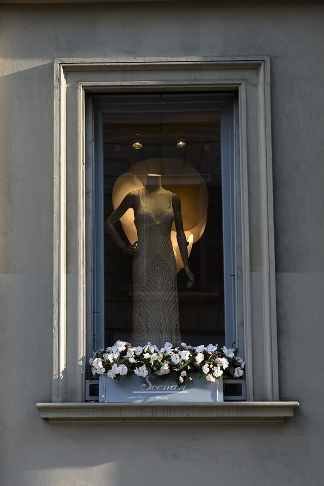 Dress, Fixture, Sculpture, Waist, Day dress, One-piece garment, Flower Arranging, Cocktail dress, Floral design, Balcony, 