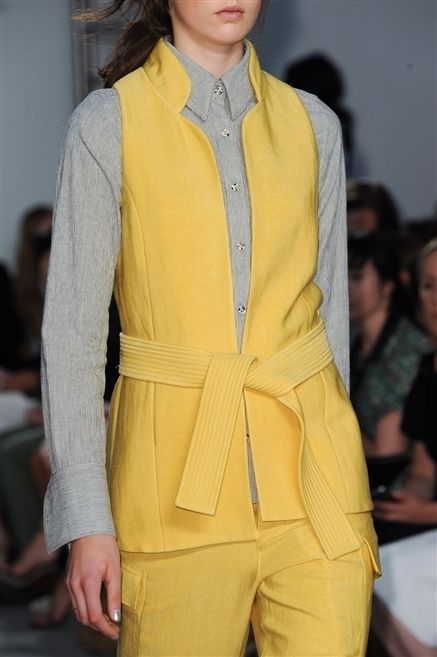 Yellow, Sleeve, Jacket, Collar, Textile, Joint, Outerwear, Fashion show, Style, Fashion model, 