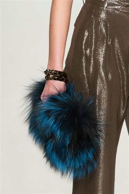 Wrist, Natural material, Fashion, Electric blue, Feather, Teal, Animal product, Turquoise, Fur, Aqua, 