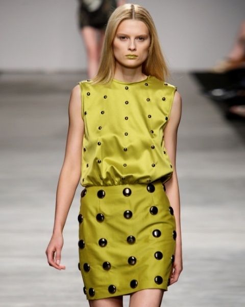 Clothing, Yellow, Sleeve, Shoulder, Joint, Fashion show, Fashion model, Style, One-piece garment, Dress, 