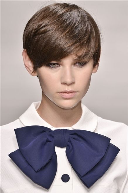 Lip, Dress shirt, Hairstyle, Collar, Chin, Bangs, Style, Formal wear, Jaw, Costume accessory, 