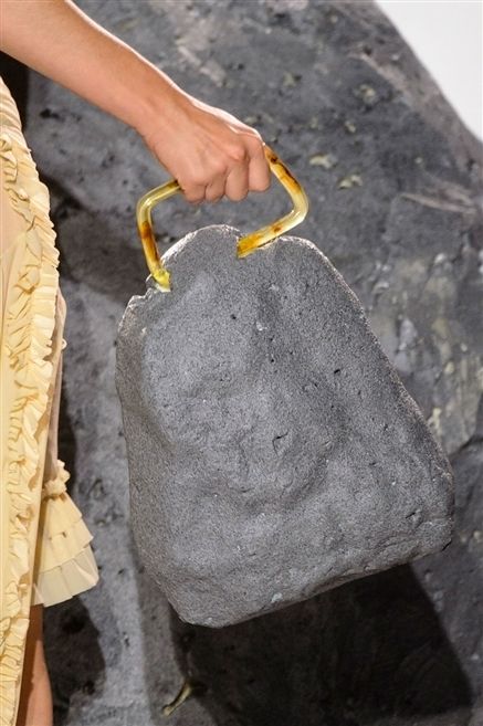 Rock, Wrist, Grey, Natural material, Mineral, Stone tool, 