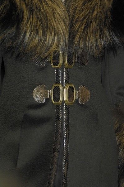 Textile, Collar, Outerwear, Fashion, Jacket, Button, Fur, Natural material, Leather, Earrings, 
