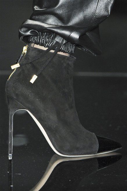 High heels, Boot, Black, Leather, Still life photography, Fashion design, Synthetic rubber, Sandal, Foot, Costume accessory, 