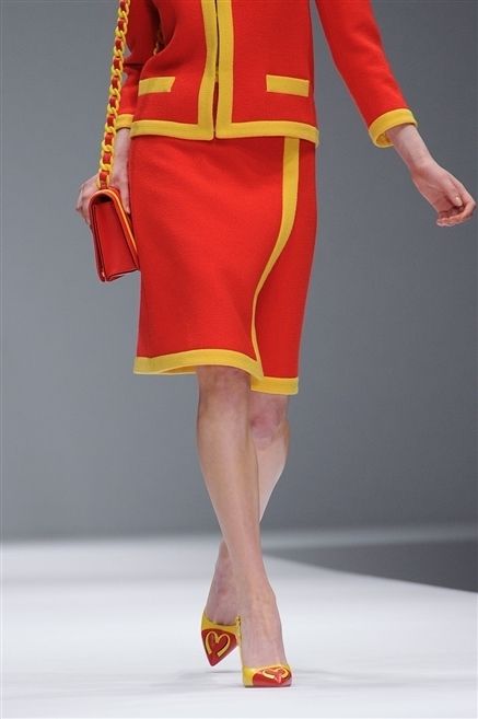 Yellow, Sleeve, Human leg, Shoulder, Red, Joint, Style, Waist, High heels, Fashion show, 