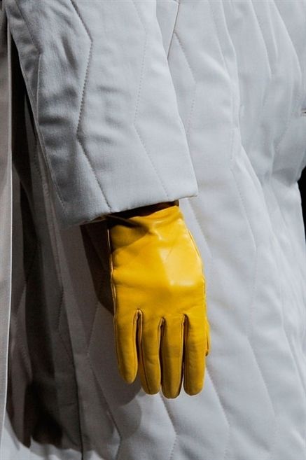Yellow, Sleeve, Textile, Personal protective equipment, Safety glove, Nail, Workwear, Cuff, Glove, Gesture, 