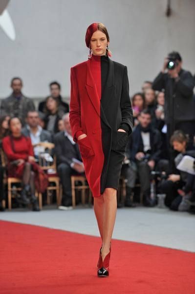 Event, Fashion show, Red, Outerwear, Runway, Flooring, Fashion model, Style, Fashion, Carpet, 