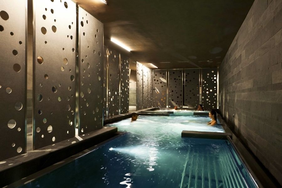 Fluid, Swimming pool, Wall, Interior design, Ceiling, Aqua, Composite material, Tile, Water feature, Design, 