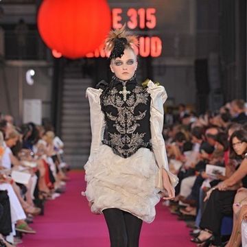 Clothing, Footwear, Fashion show, Event, Shoulder, Runway, Lantern, Joint, Red, Outerwear, 