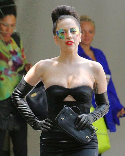 Face, Head, Arm, Human body, Latex, Strapless dress, Fashion, Costume, Fictional character, Latex clothing, 