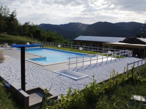Swimming pool, Plant, Property, Mountain range, Real estate, Hill station, Composite material, Resort, Rectangle, Ridge, 