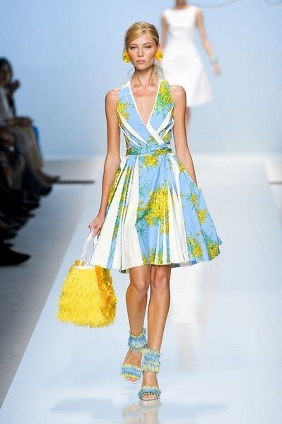 Clothing, Blue, Yellow, Fashion show, Dress, Shoulder, Textile, Joint, One-piece garment, Formal wear, 