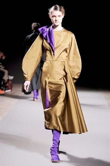 Shoe, Outerwear, Coat, Formal wear, Purple, Costume design, Fashion, Fashion show, Fashion model, Fashion design, 