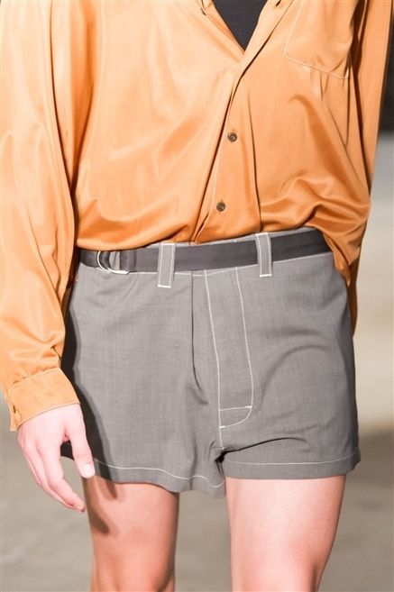 Collar, Sleeve, Human leg, Shirt, Textile, Orange, Joint, Dress shirt, Active shorts, Shorts, 