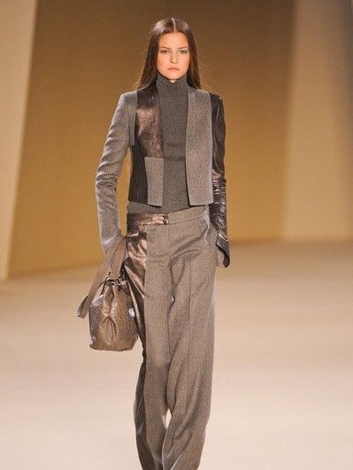 Brown, Sleeve, Human body, Shoulder, Fashion show, Joint, Outerwear, Khaki, Style, Runway, 