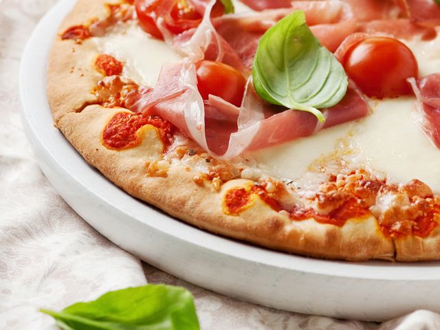 Food, Pizza, Cuisine, Ingredient, Baked goods, Dish, Leaf, Recipe, Finger food, Pizza cheese, 