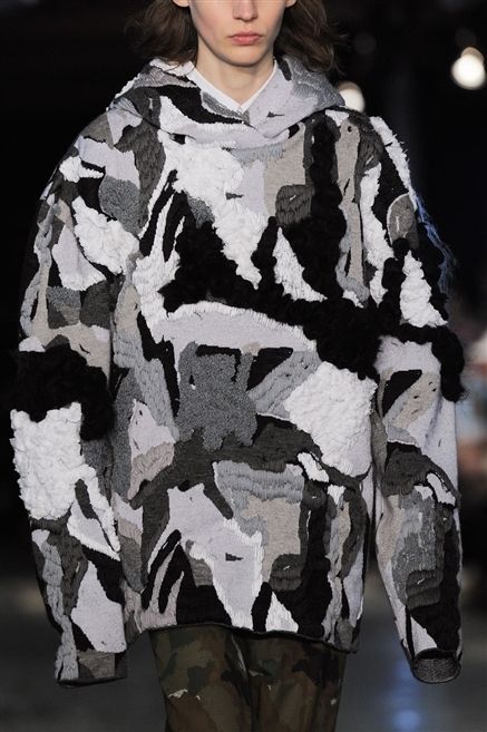 Military camouflage, Camouflage, Sleeve, Joint, Pattern, Street fashion, Fashion, Fur, Fashion model, Design, 