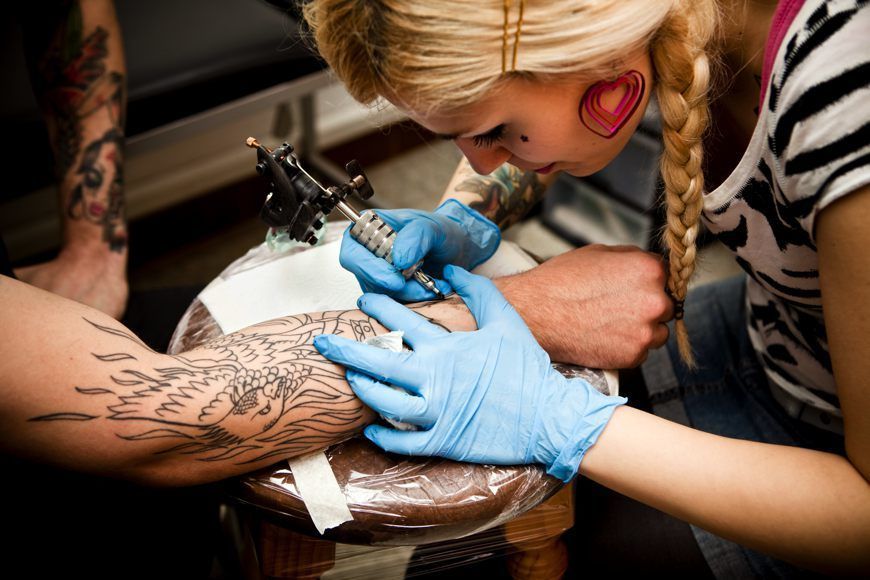 Arm, Skin, Wrist, Tattoo, Tattoo artist, Blond, Glove, Temporary tattoo, Nail, Ink, 