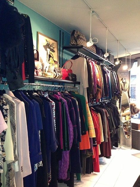 Textile, Room, Retail, Clothes hanger, Fashion, Market, Outlet store, Human settlement, Boutique, Collection, 