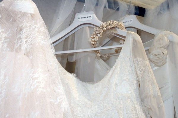 Ivory, Wedding dress, Beige, Clothes hanger, Bridal accessory, Bridal veil, Embellishment, Fashion design, Silver, Bridal clothing, 