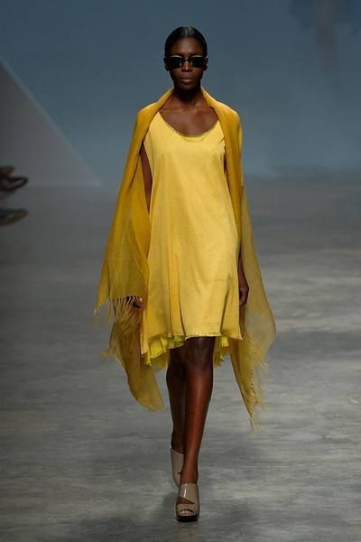 Yellow, Fashion show, Shoulder, Joint, Runway, Dress, Style, Summer, Jewellery, Fashion model, 