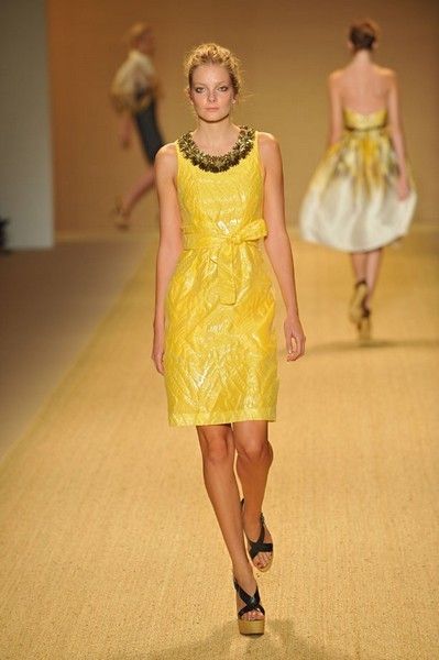 Clothing, Yellow, Dress, Shoulder, Joint, One-piece garment, Human leg, Standing, Waist, Formal wear, 