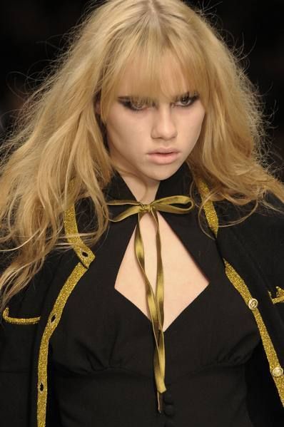 Clothing, Hair, Lip, Hairstyle, Collar, Bangs, Style, Blond, Fashion, Beauty, 