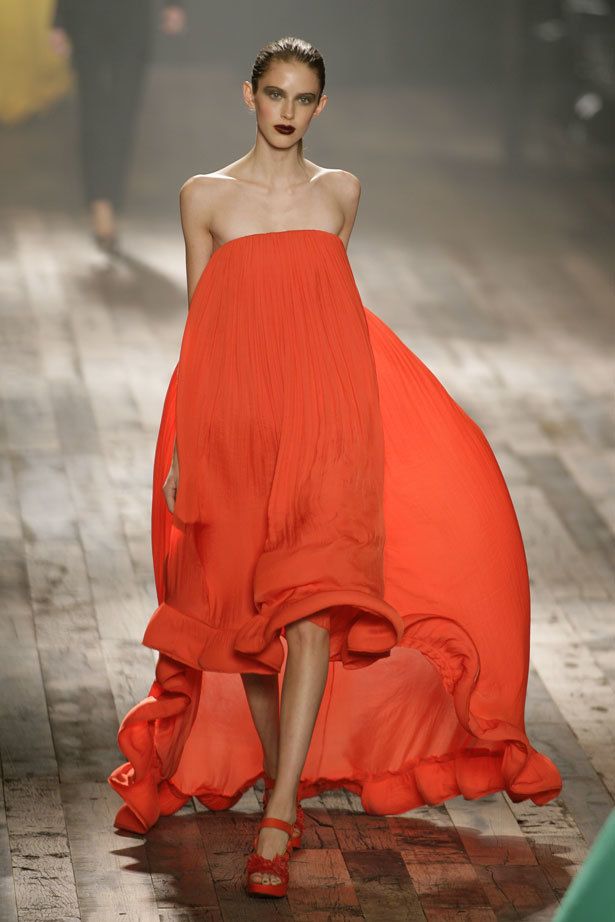 Shoulder, Dress, Joint, Red, Fashion show, One-piece garment, Formal wear, Fashion model, Gown, Fashion, 
