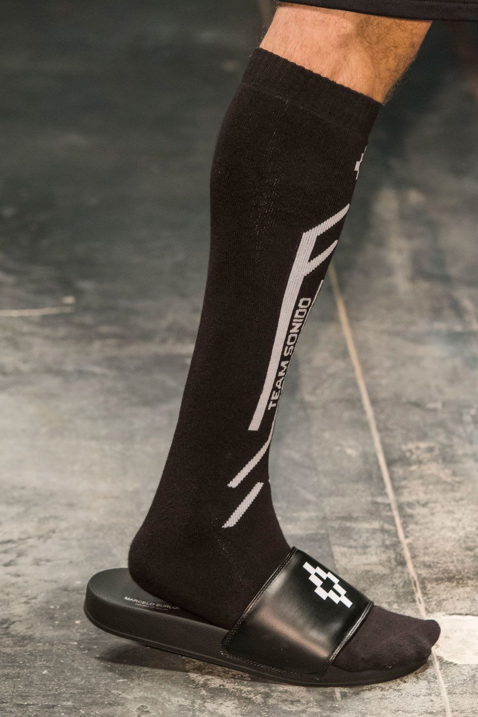 Human leg, Joint, Carmine, Fashion, Black, Street fashion, Grey, Close-up, Calf, Leather, 