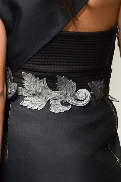 Black, Wing, Embellishment, Waist, Body jewelry, Silver, Day dress, Natural material, One-piece garment, 