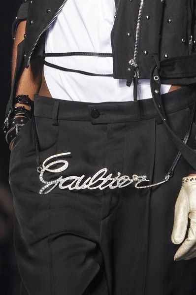 Textile, Fashion, Pocket, Leather, Belt, Fashion design, Button, Fish, Shoulder bag, 