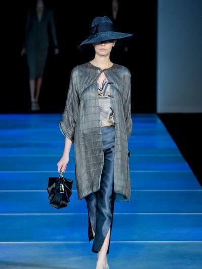 Blue, Fashion show, Hat, Human body, Shoulder, Joint, Outerwear, Runway, Style, Bag, 