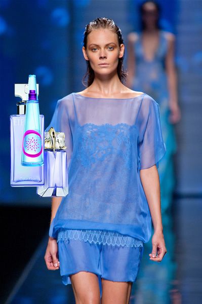 Shoulder, Bottle, Electric blue, Fashion, Eyelash, One-piece garment, Fashion show, Majorelle blue, Cobalt blue, Waist, 