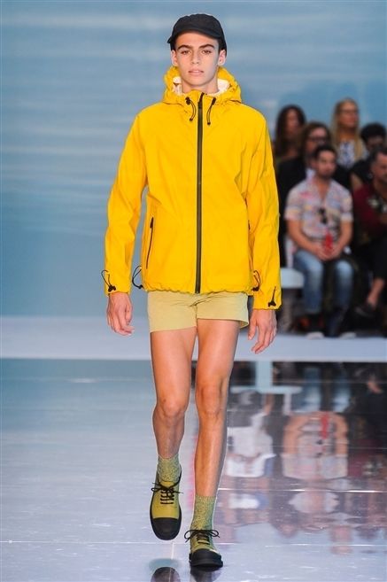Clothing, Footwear, Yellow, Event, Fashion show, Human leg, Shoulder, Joint, Outerwear, Jacket, 