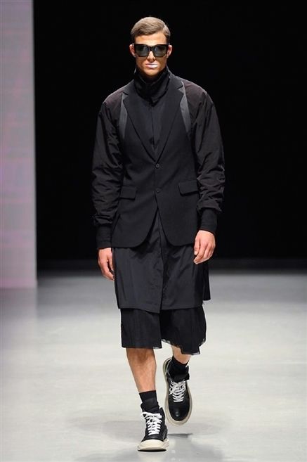 Clothing, Footwear, Fashion show, Sleeve, Human body, Shoulder, Joint, Outerwear, Sunglasses, Runway, 