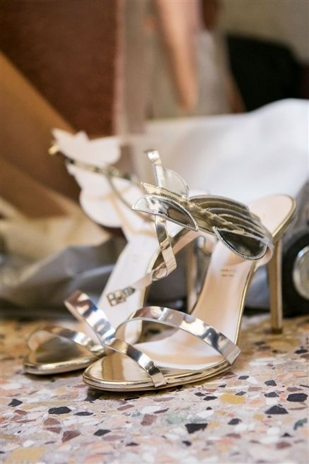 Sandal, Metal, Bridal shoe, High heels, Silver, Natural material, Slingback, Bridal accessory, Still life photography, Wedding ceremony supply, 