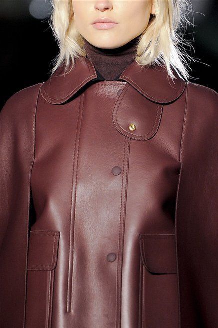 Clothing, Lip, Jacket, Brown, Sleeve, Collar, Textile, Outerwear, Style, Leather, 