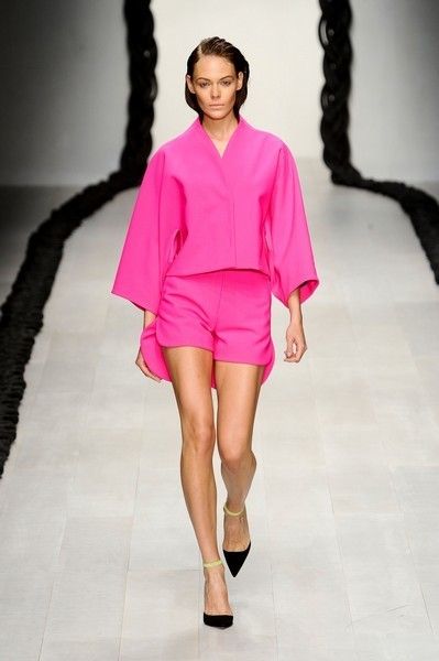 Clothing, Footwear, Fashion show, Shoulder, Textile, Joint, Human leg, Runway, Pink, Style, 