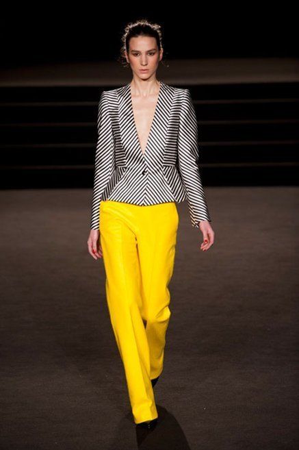 Clothing, Yellow, Sleeve, Human body, Trousers, Fashion show, Shoulder, Joint, Outerwear, Style, 
