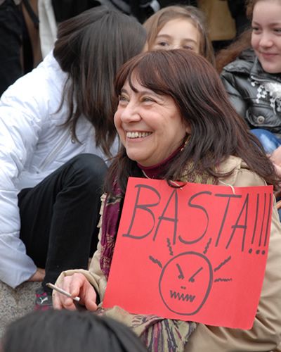 People, Facial expression, Handwriting, Feathered hair, Laugh, Street fashion, Blond, Layered hair, Protest, Long hair, 