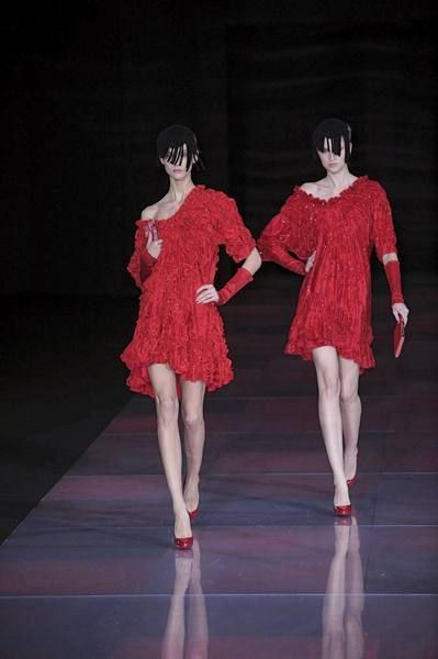 Sleeve, Dress, Red, One-piece garment, Pattern, Cocktail dress, Costume design, Fashion, Waist, Fashion design, 