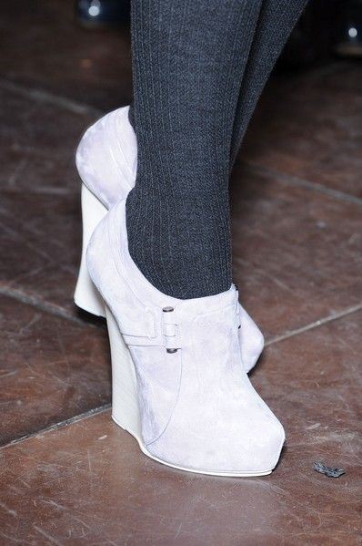 Floor, Human leg, Flooring, Black, Grey, Sock, Wood stain, Tights, Silver, Walking shoe, 