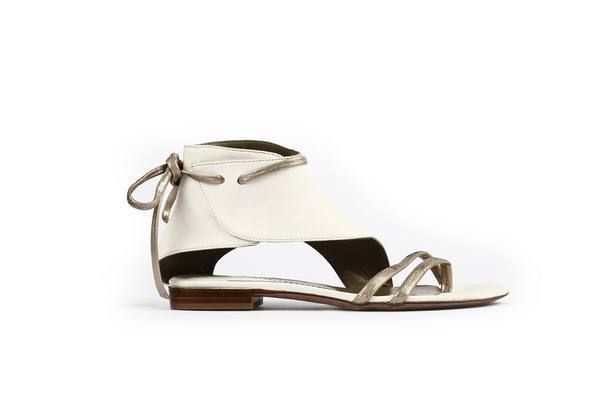Tan, Beige, Sandal, Leather, Strap, Fashion design, Eye glass accessory, Natural material, Silver, Still life photography, 