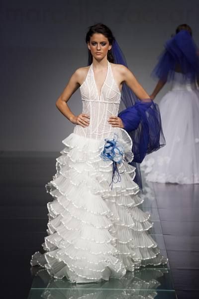Blue, Hairstyle, Shoulder, Textile, Gown, Formal wear, Wedding dress, Dress, One-piece garment, Waist, 
